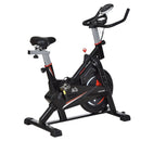 Black Stationary Exercise Bike with Adjustable Resistance and LCD Monitor