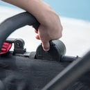 Red Foldable Baby Stroller with Reclining Backrest and Adjustable Canopy