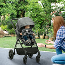 Grey Foldable Baby Stroller with Reclining Backrest and Adjustable Canopy